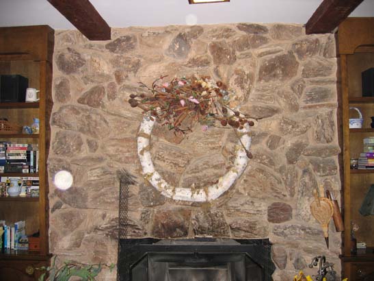 Before close up shot of a basic stone fireplace